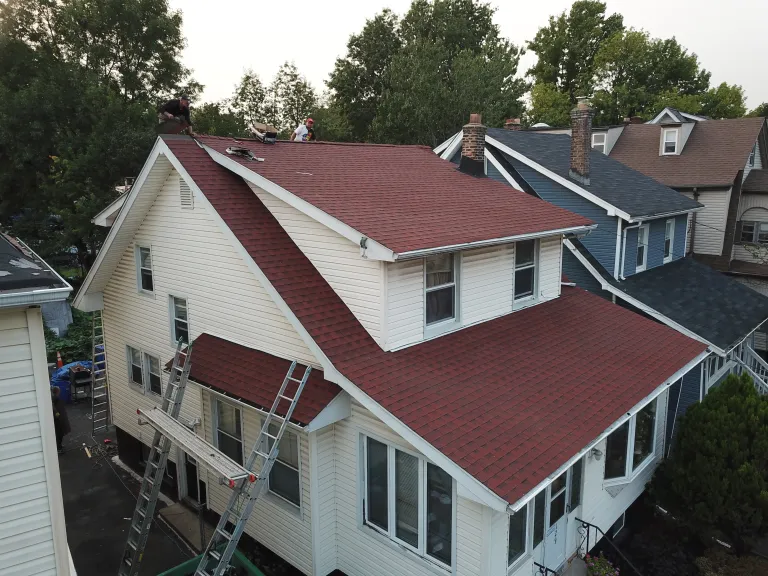 NJ Roofing crew on a residential roof replacement project in New Jersey
